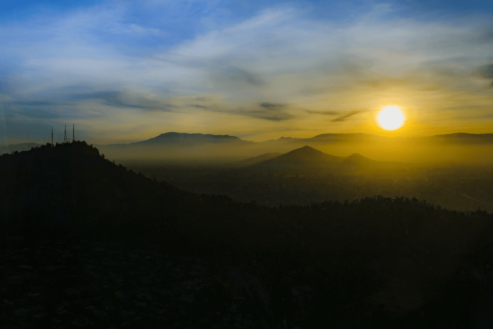 scenic-view-silhouette-mountains-against-sky-sunset.png